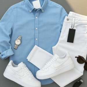 casual men's outfit featuring a light blue button-down shirt, white jeans, and white Nike Air Force 1 sneakers.